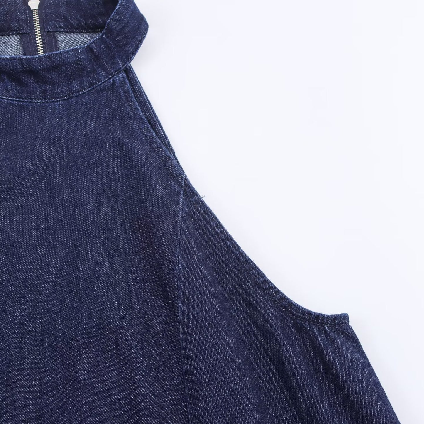 Woman wearing Halter Neck Denim Dress in a casual outdoor setting