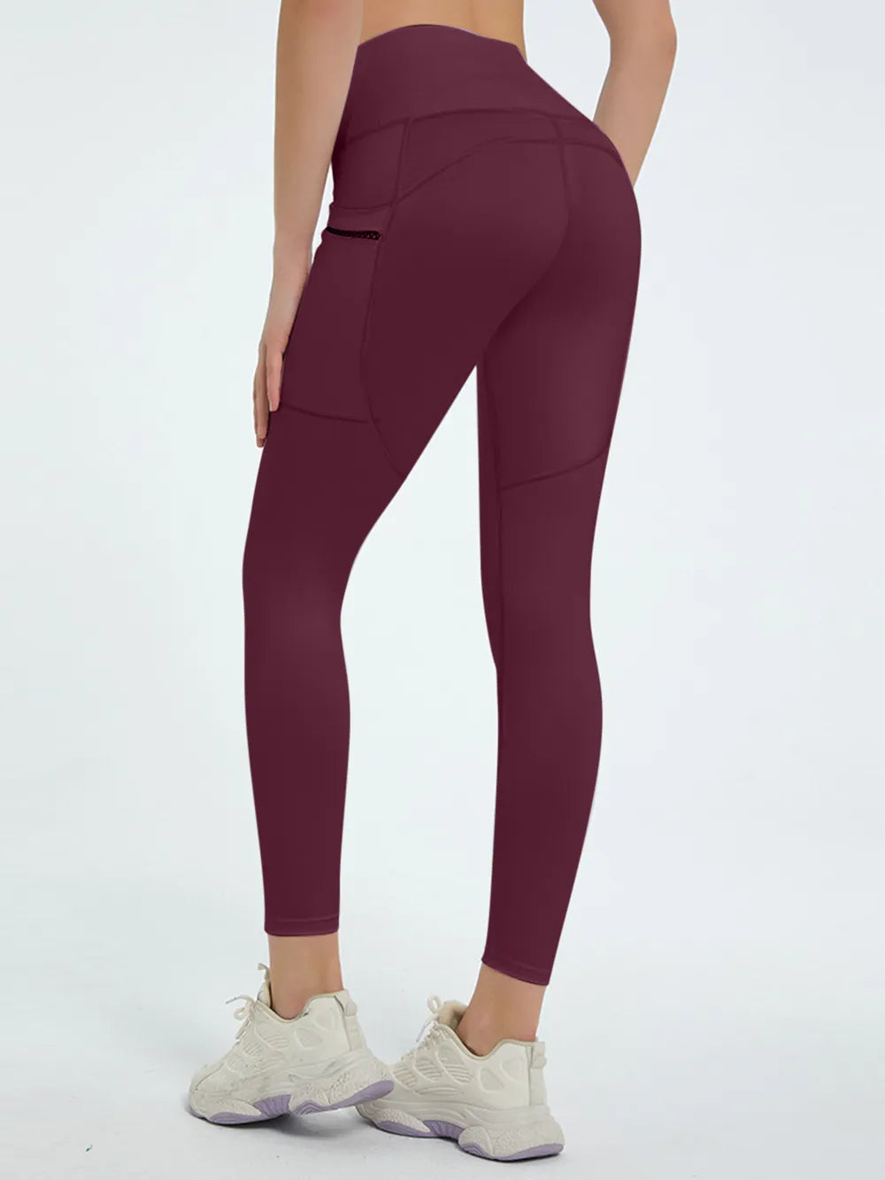Woman wearing High Waist Active Leggings in a fitness setting