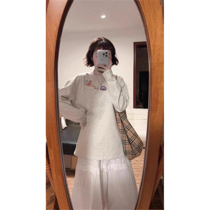 Woman wearing Geometric Pattern Long Sleeve Top in a casual setting