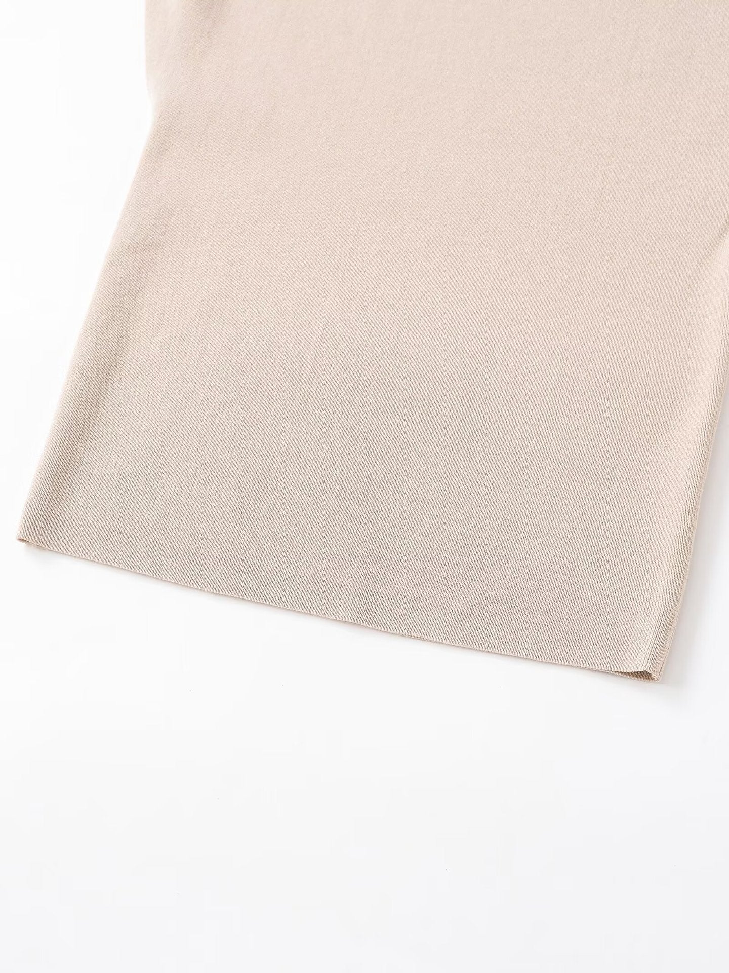 Woman wearing Asymmetric Knitted Top in a casual setting