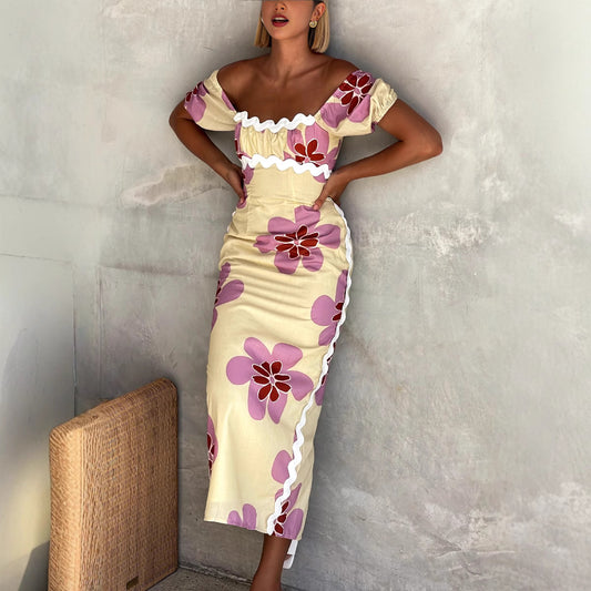 Woman wearing Floral Split Printed Midi Dress in a sunny outdoor setting