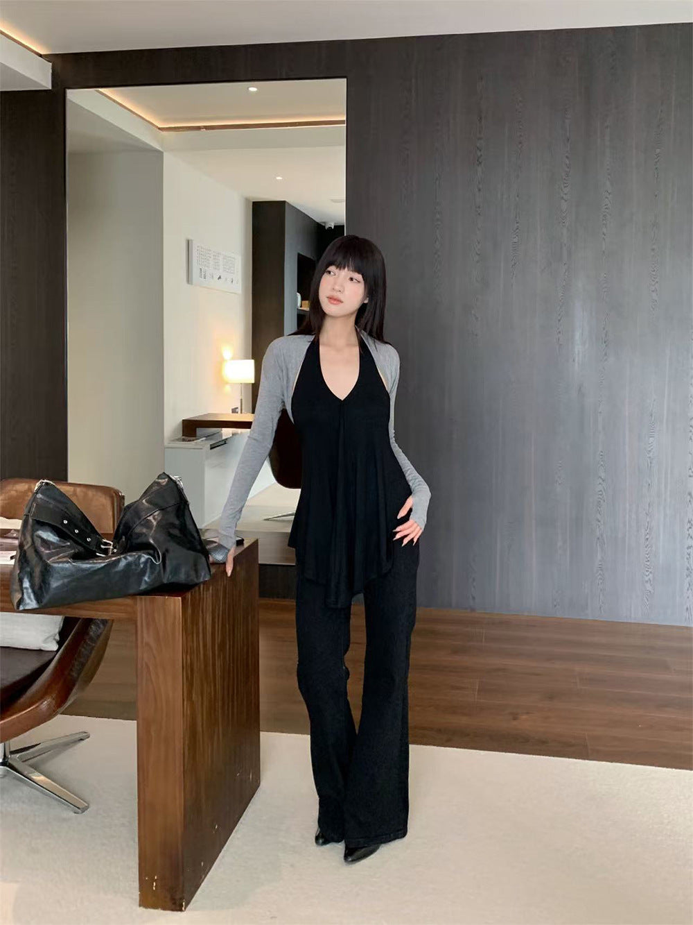 Woman wearing Long Sleeve Cardigan in a cozy indoor setting