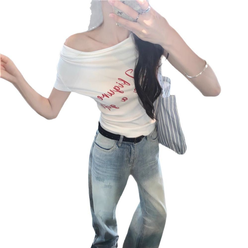 Woman wearing One Shoulder Fitted Crop Top in a casual setting