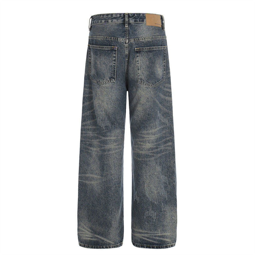 Woman wearing Whitewashed Loose Denim Pants in urban setting
