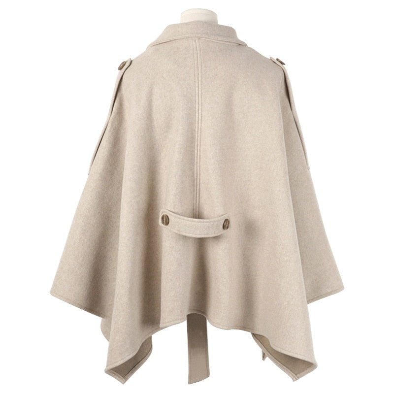 Woman wearing Plus Size Black Winter Poncho Cape Coat in a winter setting