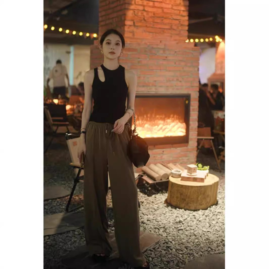 Woman wearing Wine Red Slim Fit Vest in a stylish urban setting