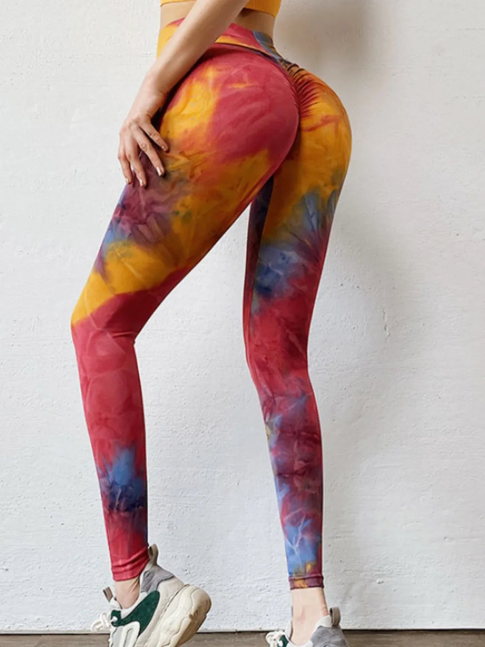 Woman wearing Tie-Dye High Waist Active Leggings in an active setting