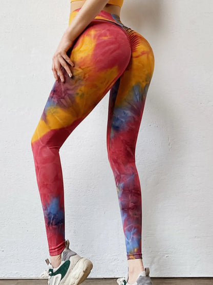 Woman wearing Tie-Dye High Waist Active Leggings in an active setting