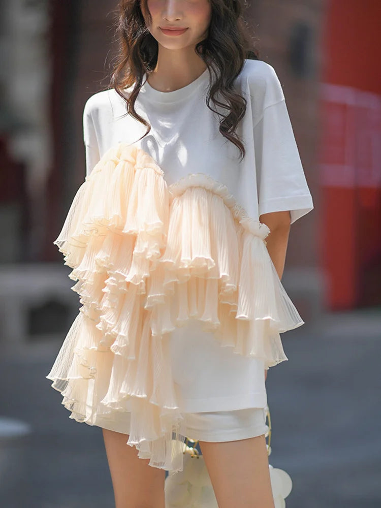 Woman wearing Cotton Mesh Patchwork Loose O Neck Short Sleeve T Shirt in a casual setting