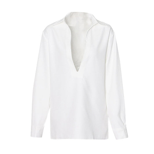 Woman wearing Vintage Minimalist Deep V Neck Blouse in a stylish setting