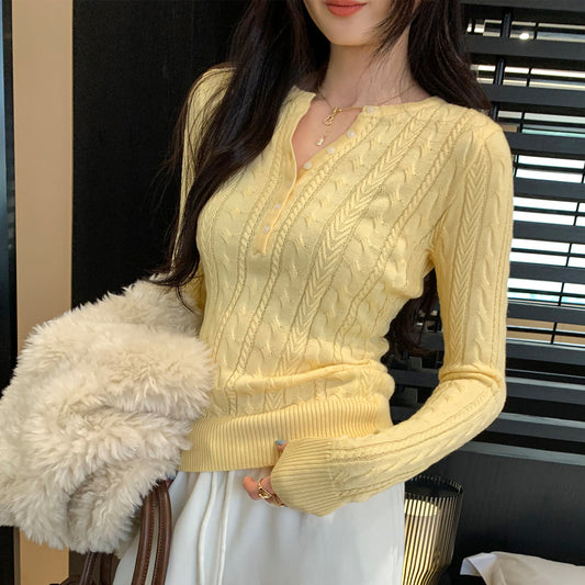 Woman wearing Half-Open Neck Cable Knit Pullover Sweater in a stylish setting
