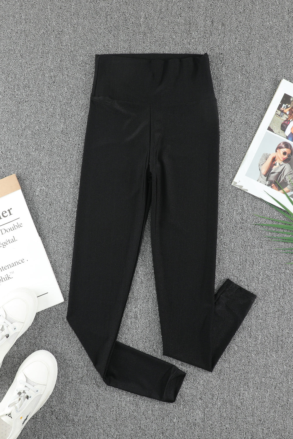 Woman wearing Black High Rise Tight Leggings in a casual setting
