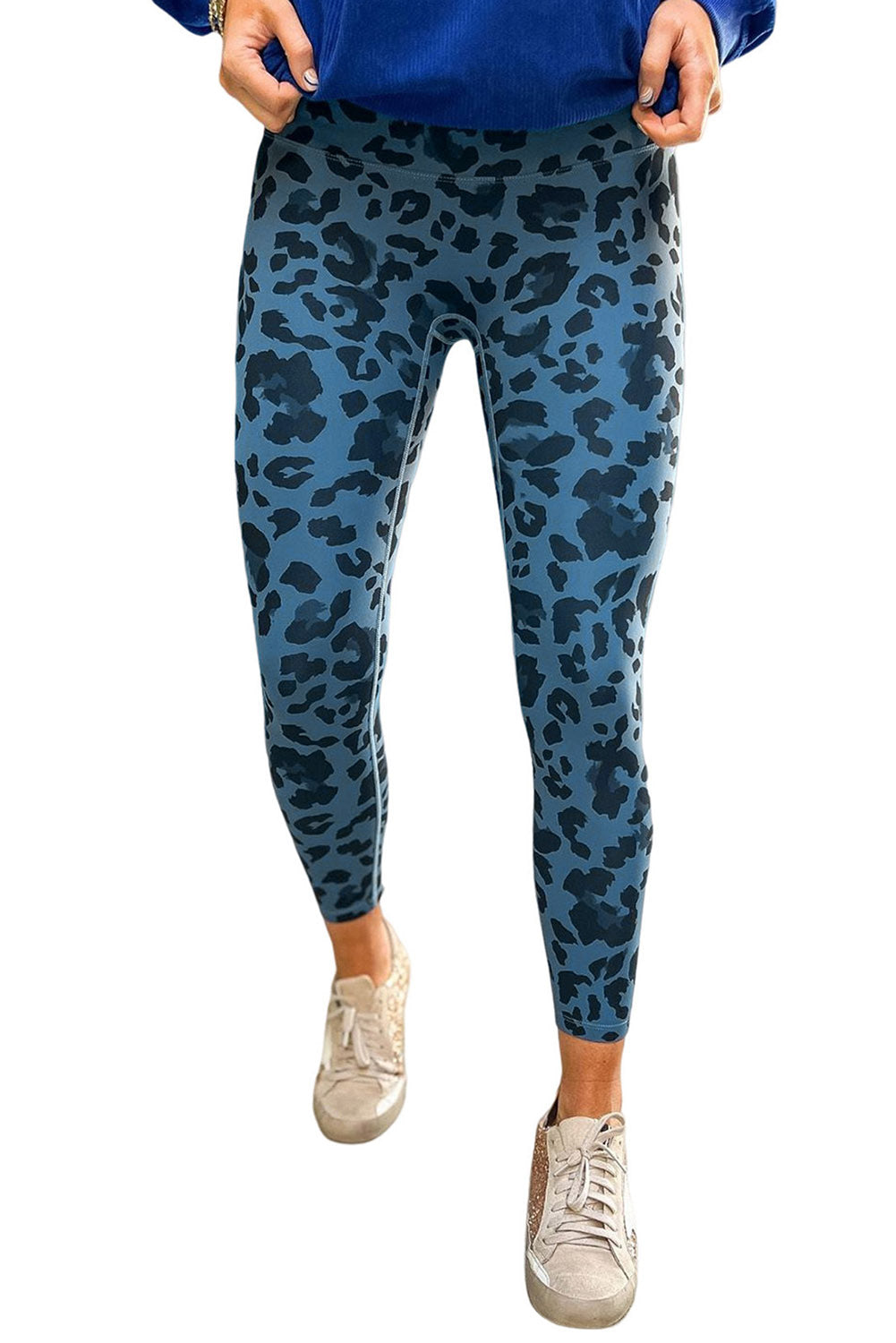 Woman wearing Classic Leopard Print Active Leggings in an urban setting