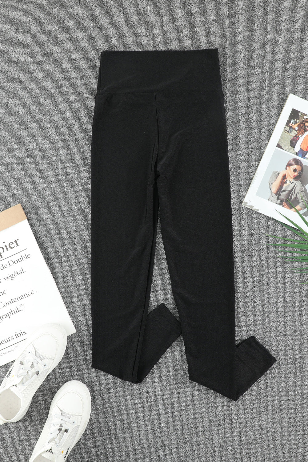 Woman wearing Black High Rise Tight Leggings in a casual setting